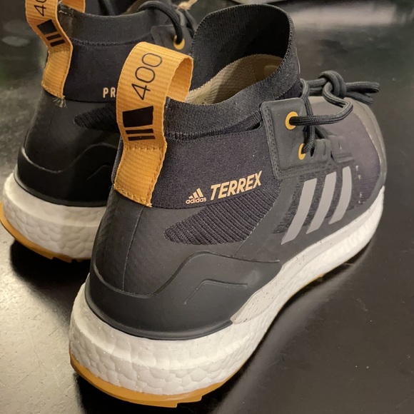 Adidas track trail running shoe.